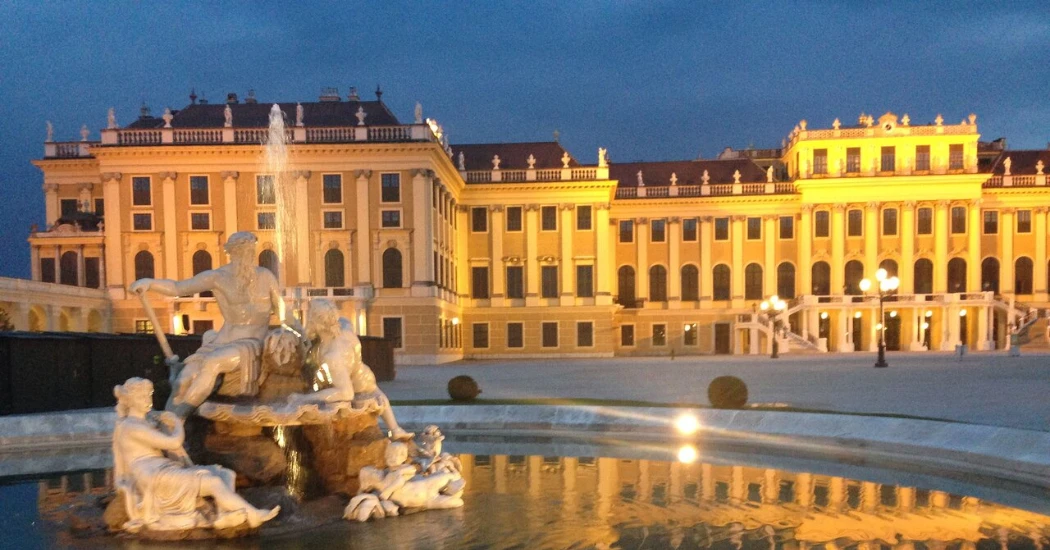 Schonbrunn Palace night view with fountain in front. 