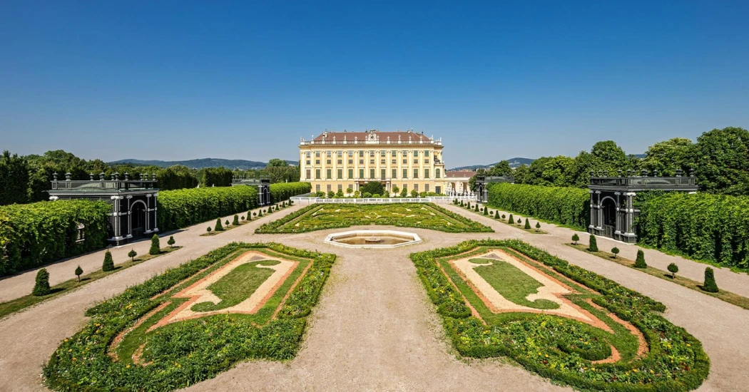 View of the Gloriette monument in Schönbrunn Palace gardens on a sunny day