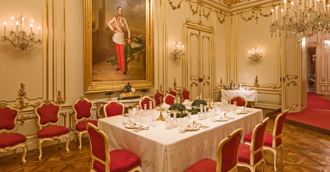 Lavish dining room inside Schönbrunn Palace showcasing Habsburg-era royal decor