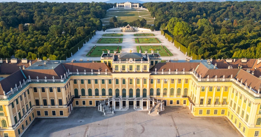 Aerial view of Schönbrunn Palace, Vienna with gardens and Gloriette in the distance